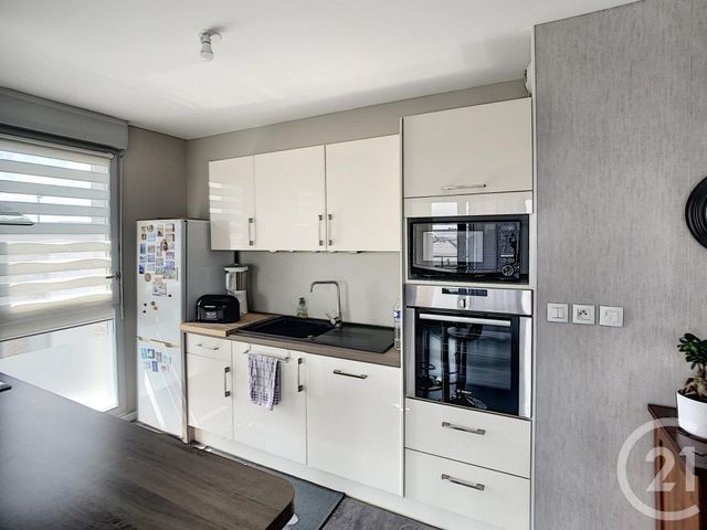 Afficher la photo en grand Appartement F4 à vendre - 4 pièces - 82.82 m2 - REIMS - 51 - CHAMPAGNE-ARDENNE - Century 21 Martinot Immobilier
