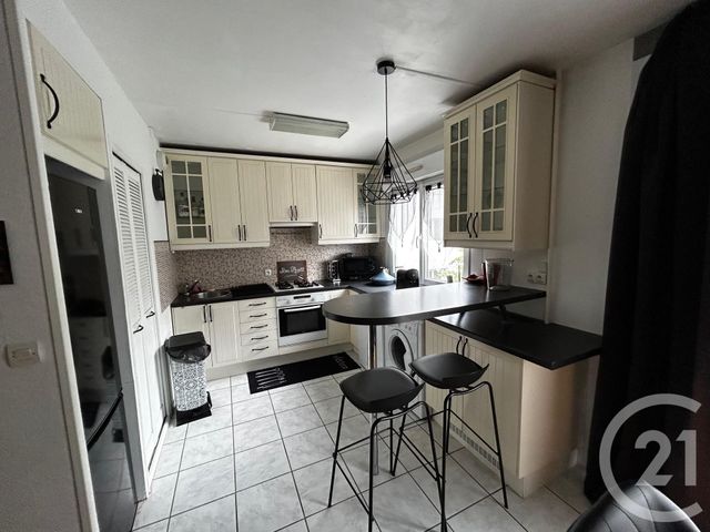 Afficher la photo en grand Appartement F3 à louer - 3 pièces - 59.65 m2 - REIMS - 51 - CHAMPAGNE-ARDENNE - Century 21 Martinot Immobilier