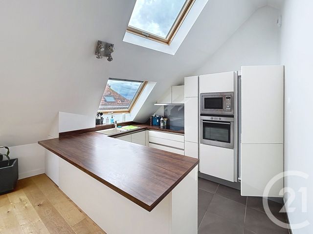 Appartement T2 à louer - 2 pièces - 55.56 m2 - REIMS - 51 - CHAMPAGNE-ARDENNE - Century 21 Martinot Immobilier