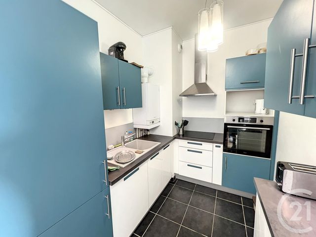 Appartement T2 à louer - 2 pièces - 50.0 m2 - REIMS - 51 - CHAMPAGNE-ARDENNE - Century 21 Martinot Immobilier